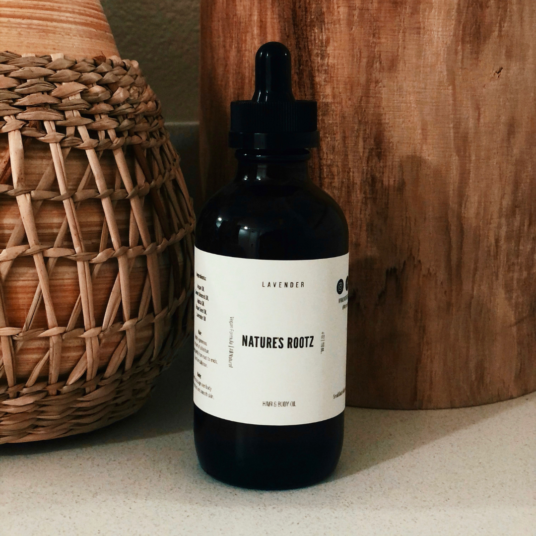A product photo of Nature's Rootz Hair Oil.